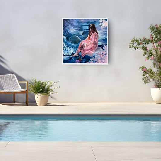 Be True original figurative oil painting displayed in a pale wooden frame beside a contemporary outdoor swimming pool.