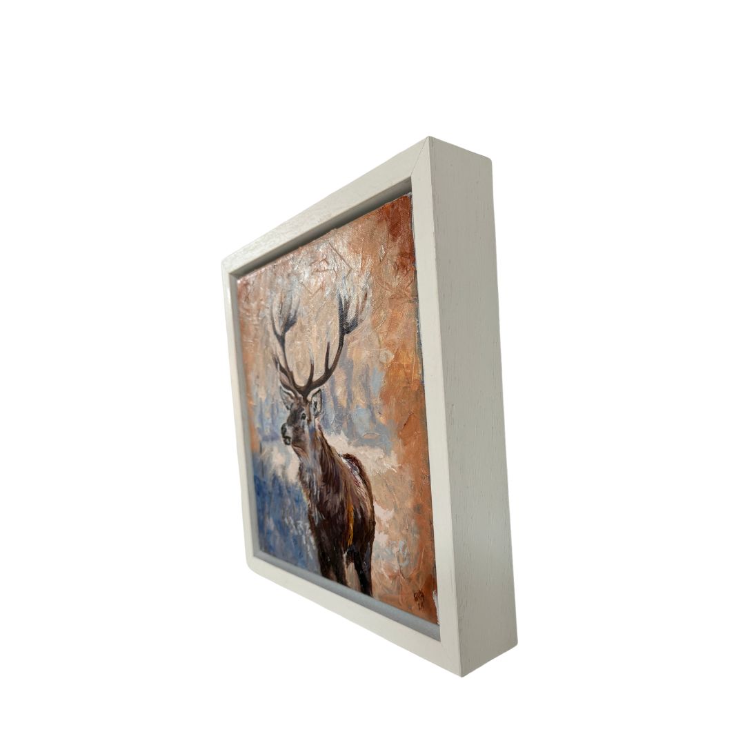 Beautifully crafted oil painting featuring a noble stag framed by a dreamlike blue and brown background. The rich textures and earthy tones bring a sense of calm and mystery, making this small artwork a perfect centerpiece for nature-inspired spaces.