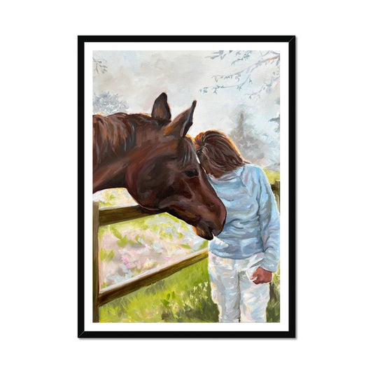 A framed fine art print in black frame option depicting a woman in a field with a horse, set against a dreamlike backdrop of wildflowers and misty countryside.