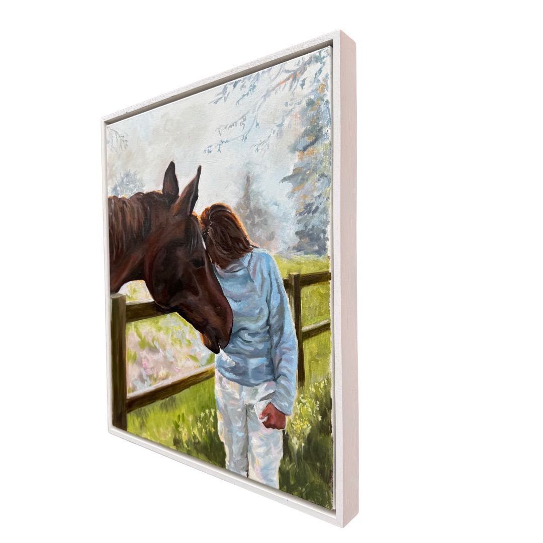Framed oil painting of a horse and a person sharing an emotional moment with their heads held gently together