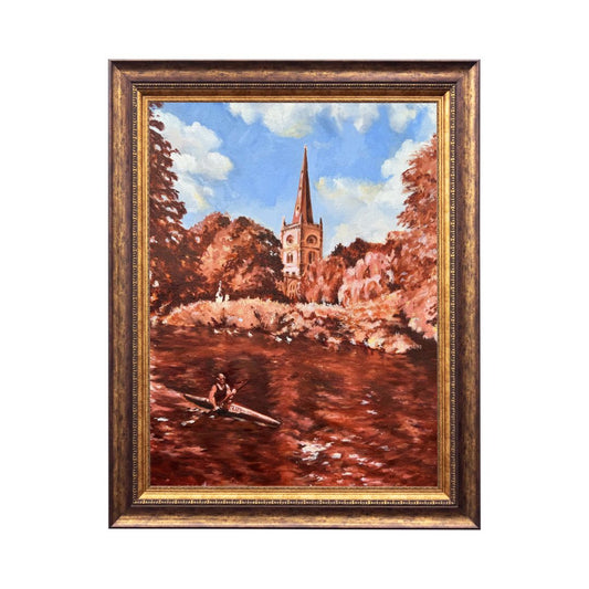 Original oil painting of Holy Trinity Church in Stratford-upon-Avon by Lorraine Field, featuring a canoeist on the River Avon, displayed in an ornate gold frame against a white background.