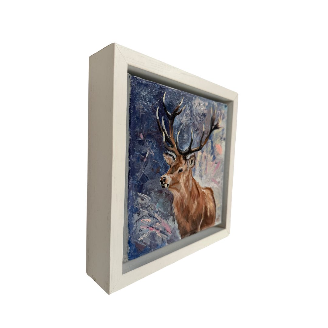 Elegant oil painting of a stag in a small decorative frame, featuring a soft and dreamy blue, white, and pink backdrop. Ideal for rustic and modern decor.