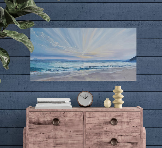 Peaceful coastal artwork showing early morning light on a sandy beach, perfect for adding comfort and nostalgia to your home