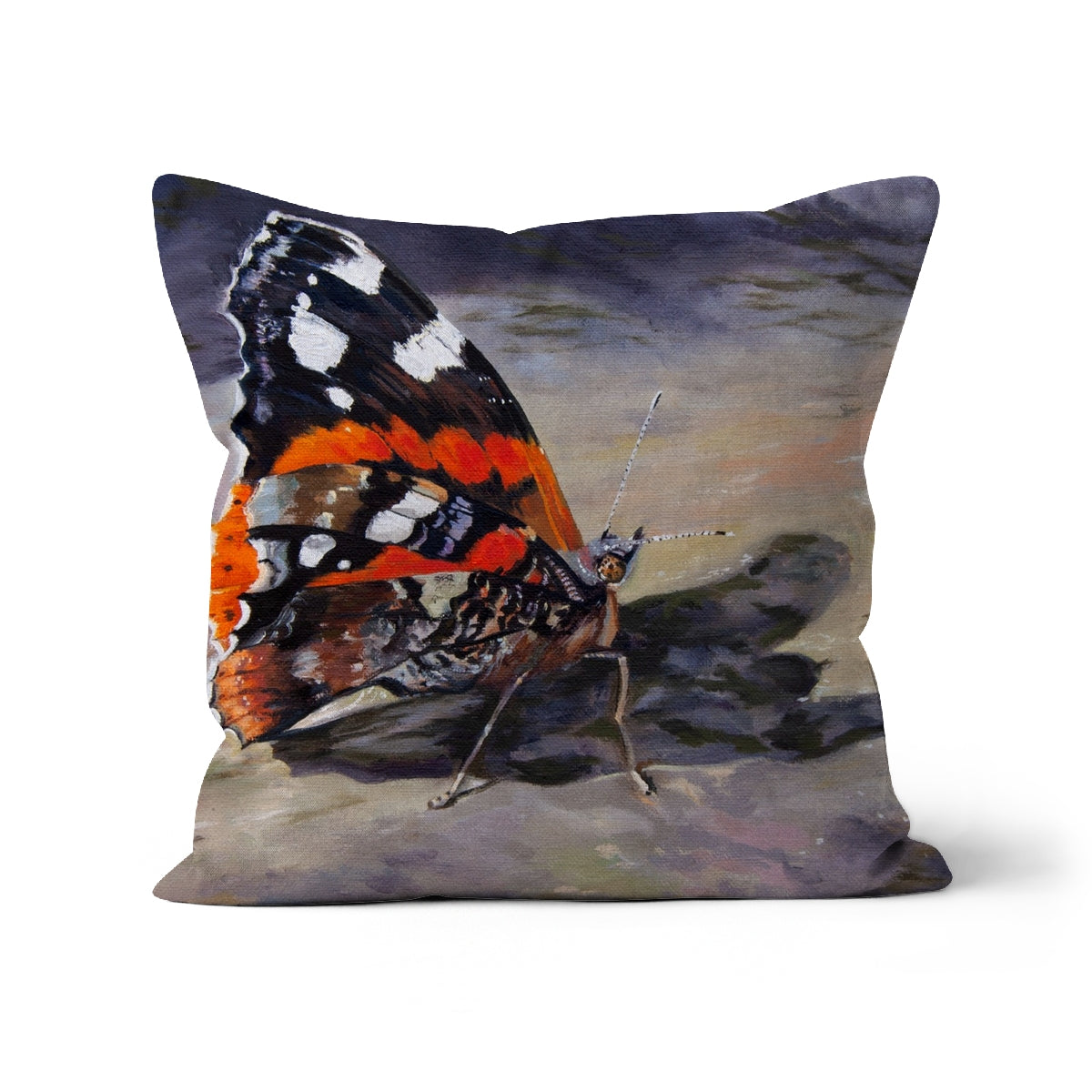Cushion with a butterfly design on a white background