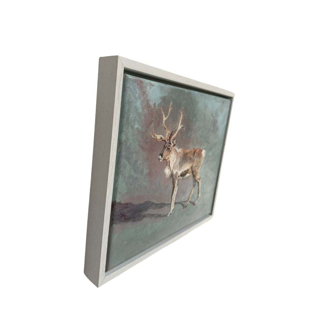 Beautiful oil painting of a reindeer, framed in a minimalist white wood frame, blending natural charm with modern style.