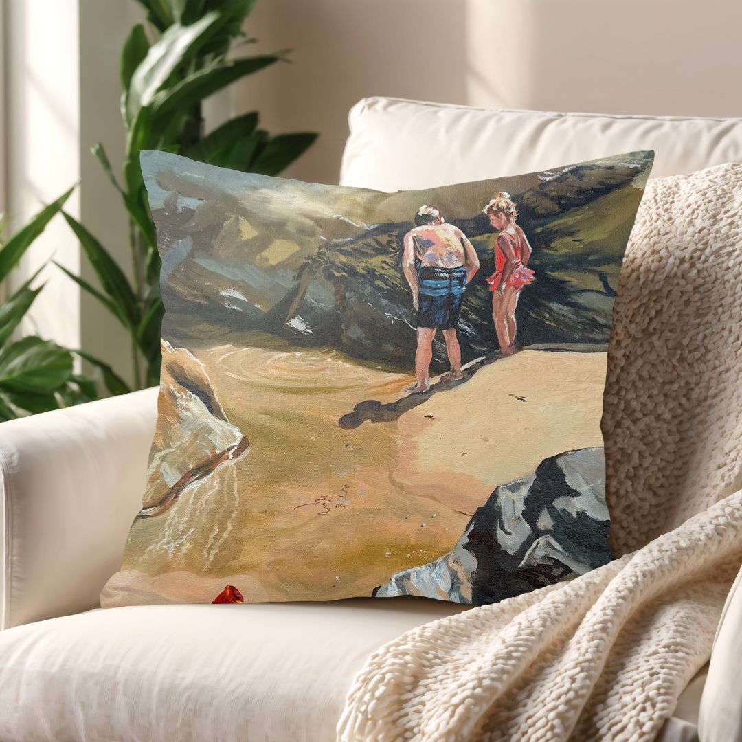 Living room mockup with Rockpool Explorers art cushion on a neutral sofa, adding seaside nostalgia and comfort to the space.