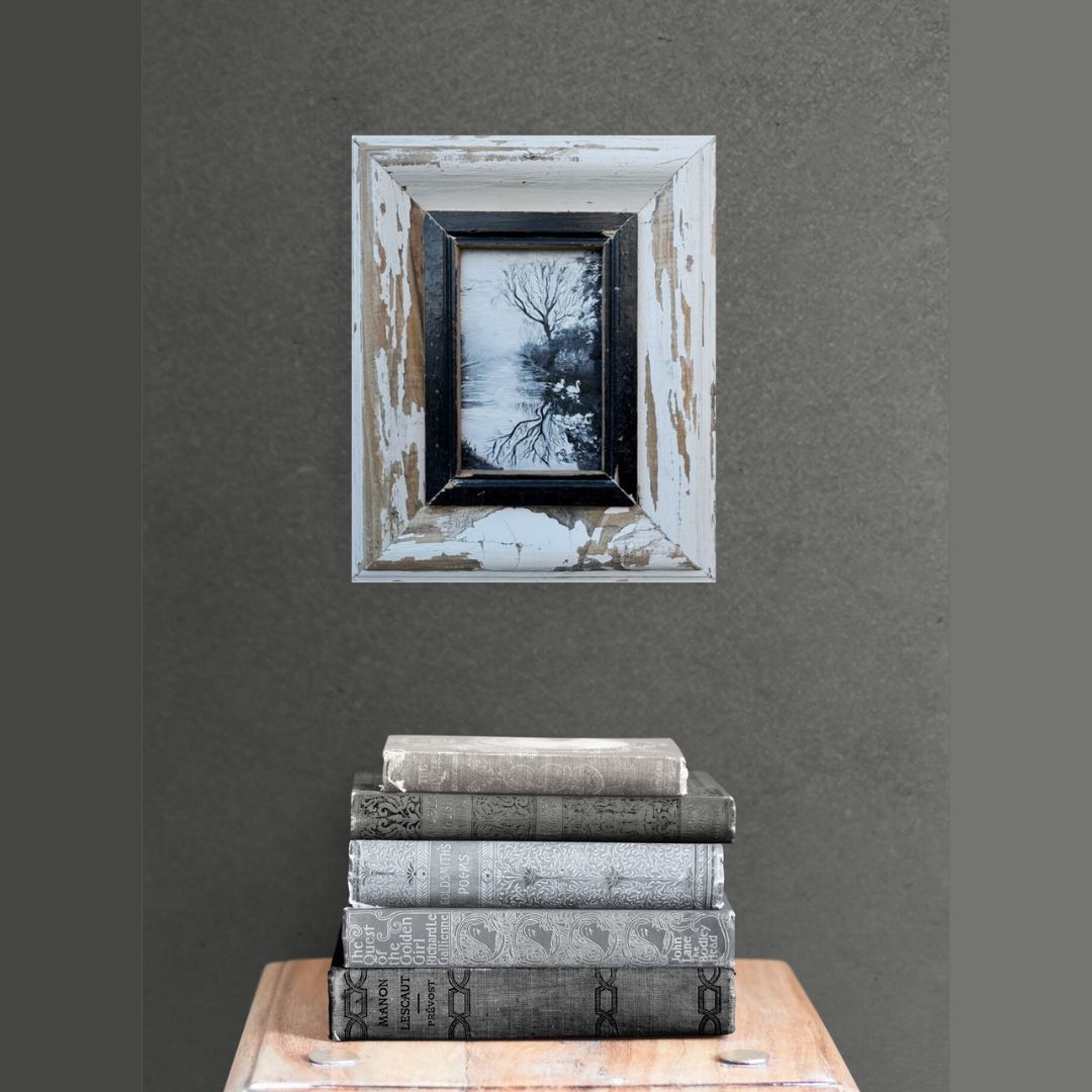 Oil painting of swans on a misty canal, beautifully framed in a rustic reclaimed wooden frame, showcasing serene water reflections and tranquil nature.