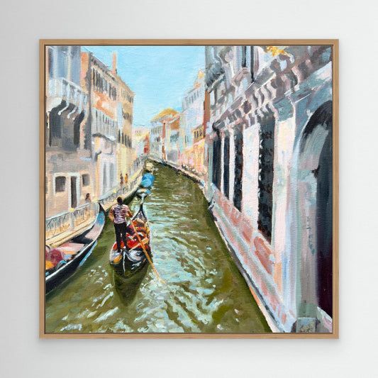 Framed painting of a Venice canal scene with gondolas and buildings.