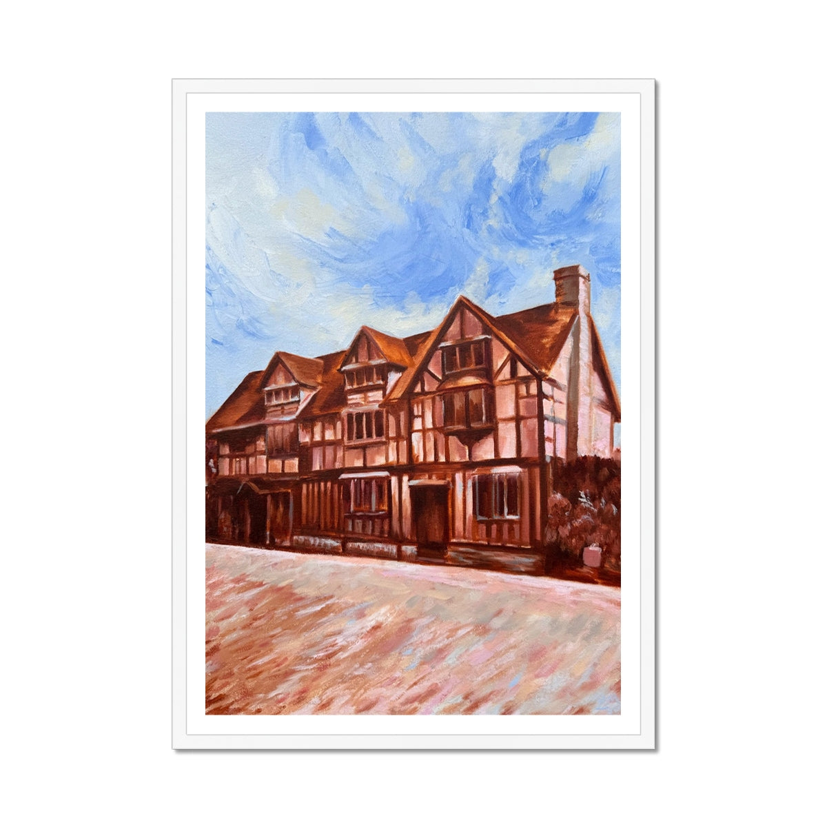 Shakespeare’s Birthplace fine art print framed in white, capturing the iconic Stratford-upon-Avon Bard's home in a soft, pastel palette.