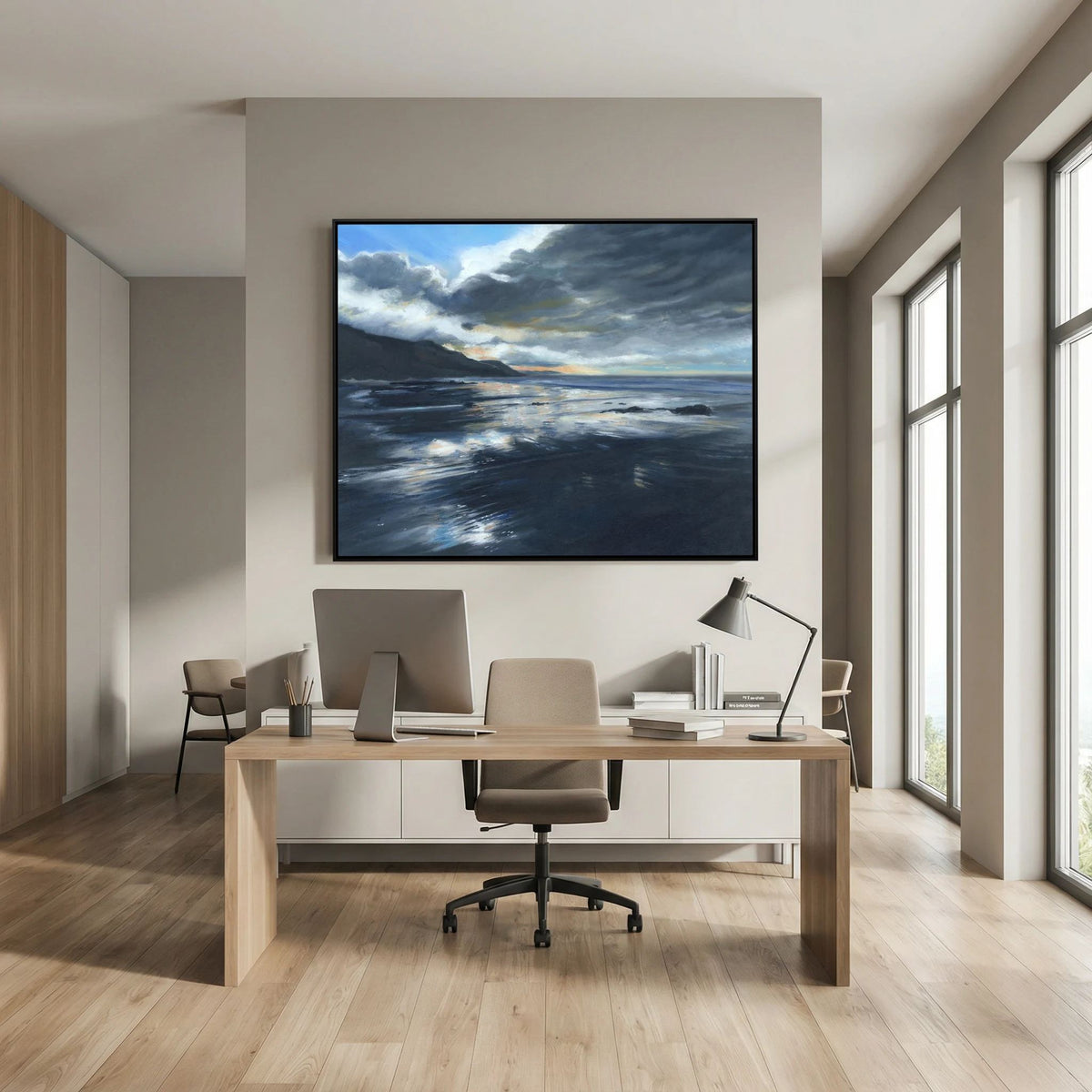 Stormy Seas framed canvas print above a desk in a modern office with large windows.