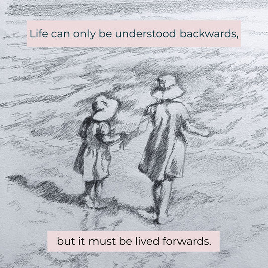 A drawing of two little girls going into the sea.