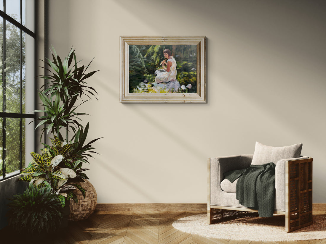 An original oil painting of a lady sitting beside a pond with lily pads surrounded by calming greenery.