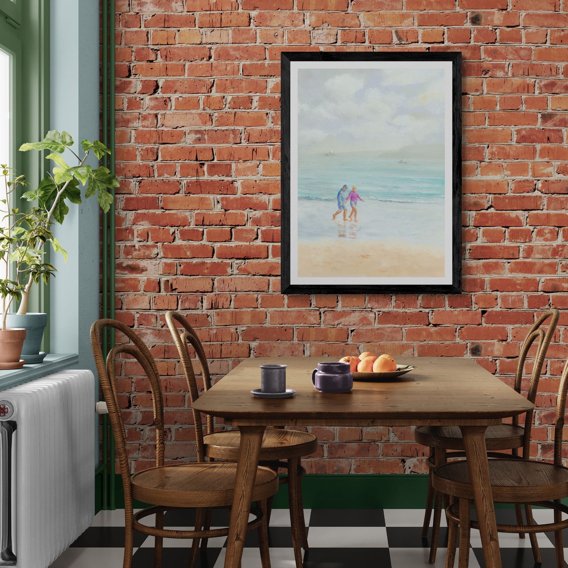 A couple walk hand in hand along the Wharf in St Ives. Cornwall Fine art print in black frame option.