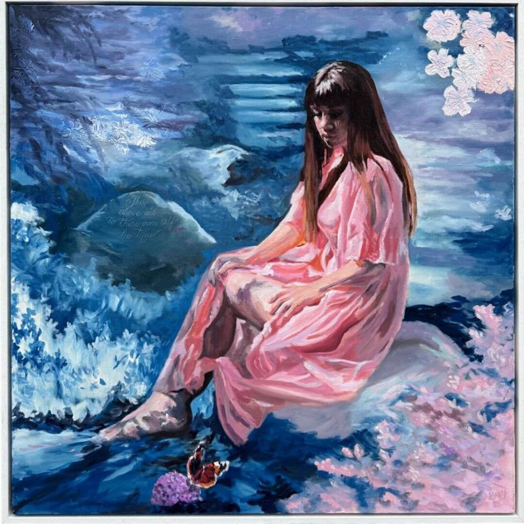 Framed original oil painting Be True, featuring a seated woman in pink within a dreamlike blue floral landscape.