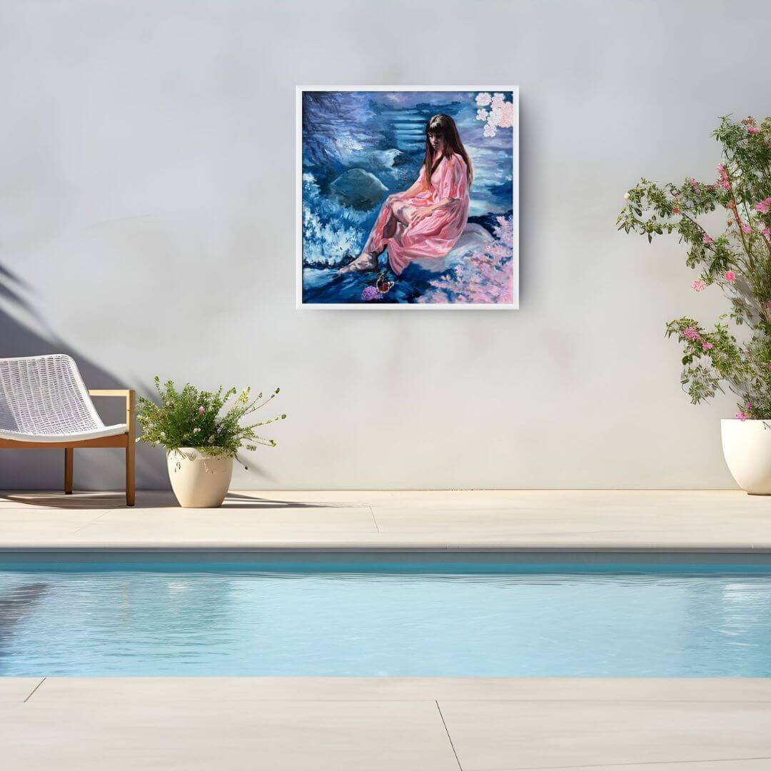 Be True original figurative oil painting displayed in a pale wooden frame beside a contemporary outdoor swimming pool.