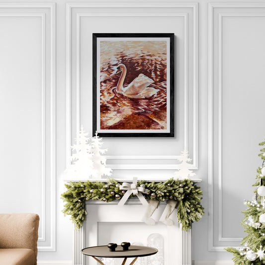 Living room with a decorated Christmas tree, beige sofa, and framed Swan artwork above a fireplace.
