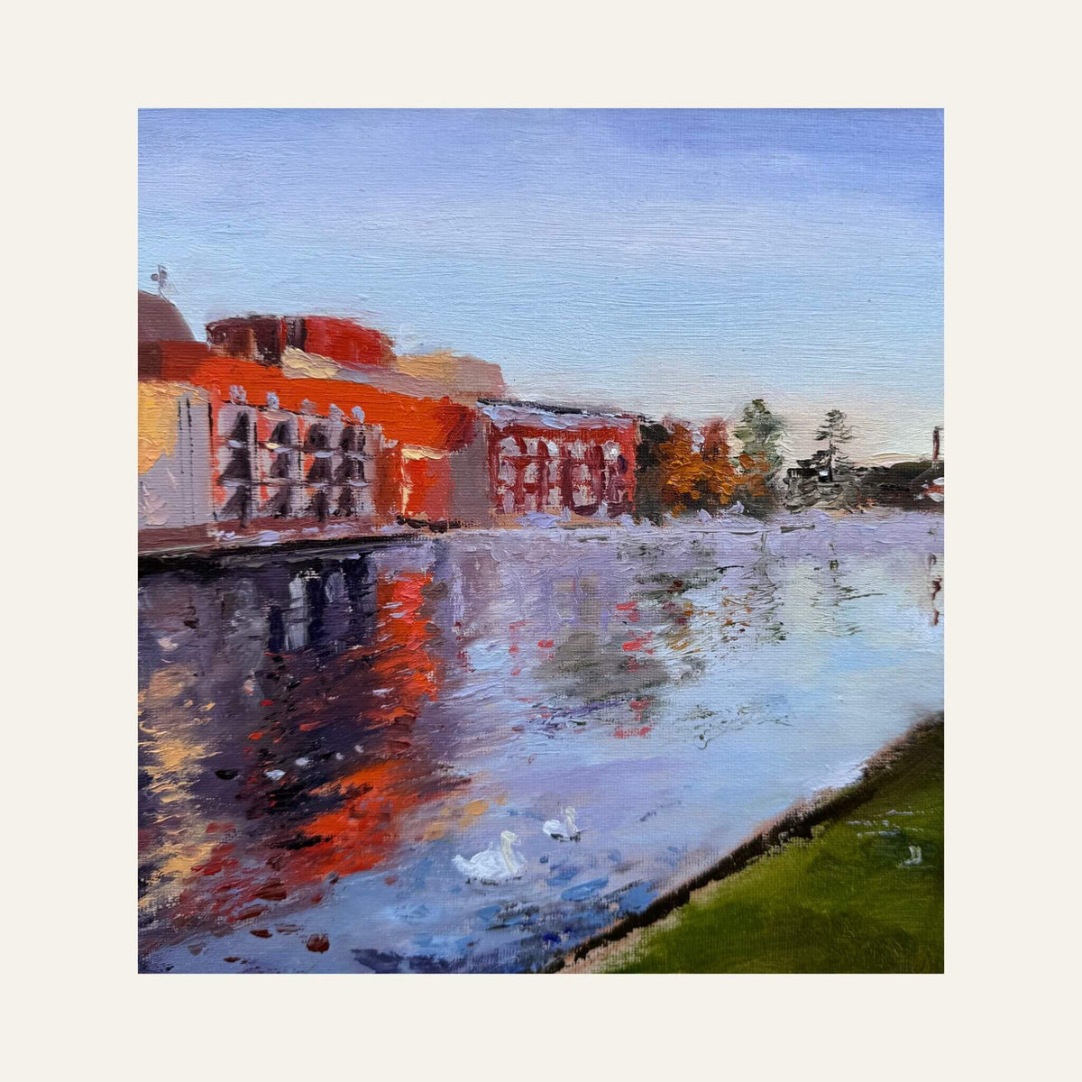 Unframed view of Autumn Colours at the RSC, showing the theatre, River Avon, pale blue sky and green riverbank.