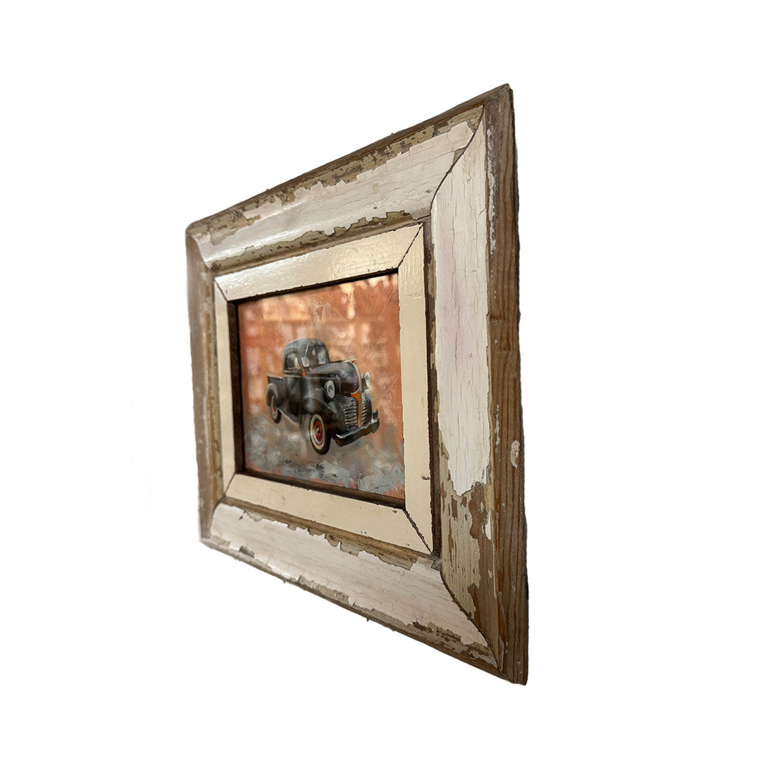 Vintage-inspired oil painting of a Dodge truck framed in reclaimed wood, showcasing classic automotive art with a rustic touch.