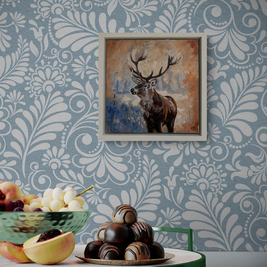 Echoes of the Wild Original Stag Framed Oil painting displayed on patterned wallpaper above fruit bowl.