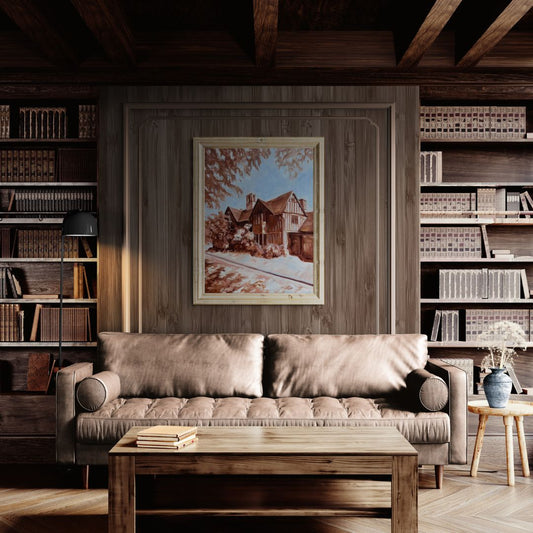 Cozy living room with a brown sofa, wooden coffee table, and oil painting of Hall's Croft in Stratford-Upon-Avon, Warwickshire.