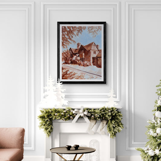 Living room with a Christmas tree, sofa, and framed Hall's Croft artwork on a white wall.