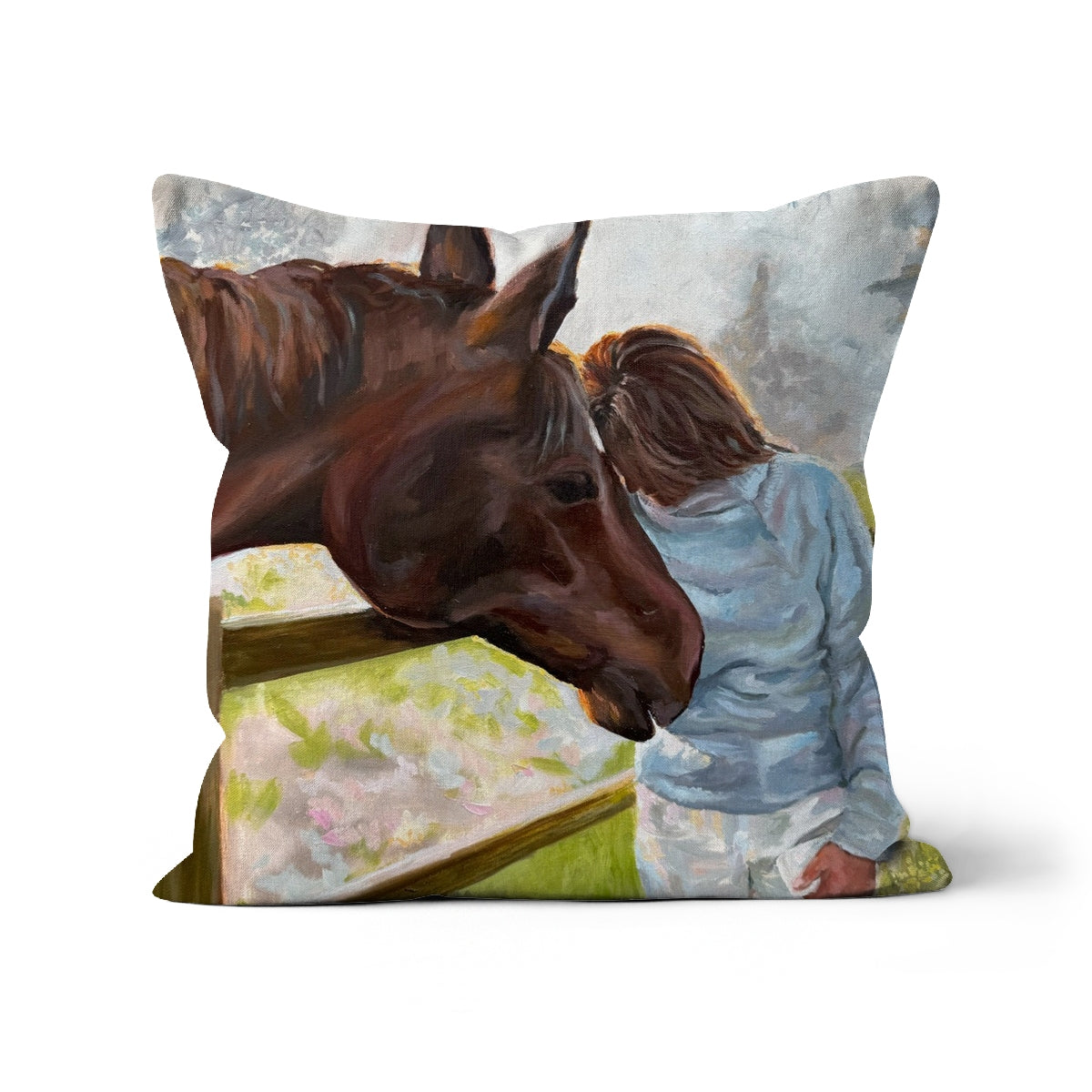 Cushion with a horse and person artwork design on a white background