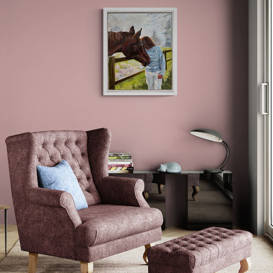 Living room with a painting of horse on canvas in white frame by artist Lorraine Field