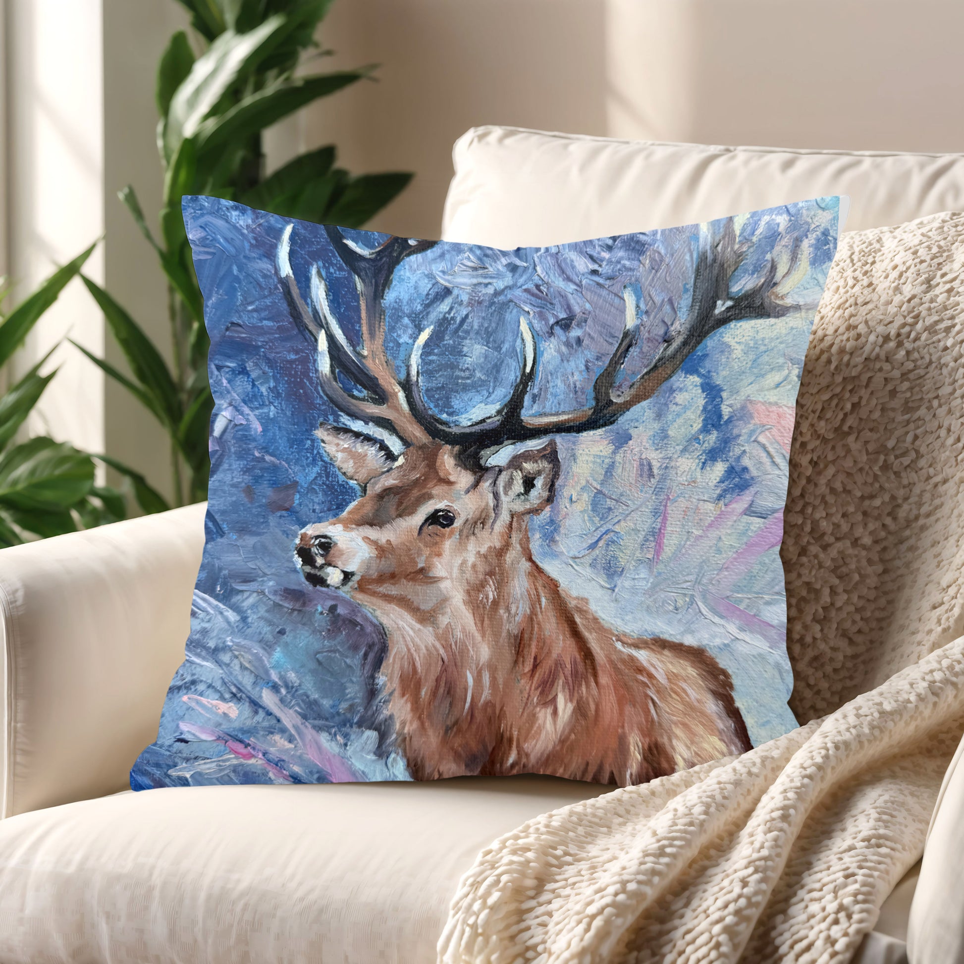 Majestic Resolve cushion styled in a cosy living room, featuring a stag design that evokes strength, grace, and comfort.