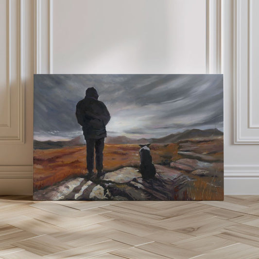 Unframed fine art print of a man standing with his border collie on a windswept moor under dramatic skies. Contemplative artwork by Lorraine Field Art.