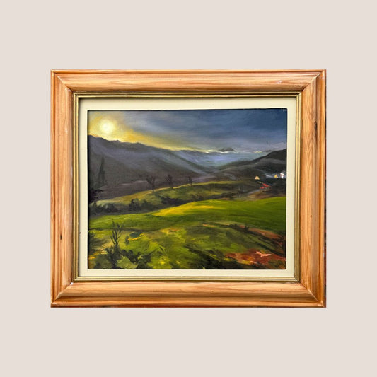 Original oil painting of the Moliterno Mountains in Italy by British artist Lorraine Field, painted on location. Atmospheric Italian mountain landscape with dramatic sunlight, rolling green hills, misty valleys and glowing evening light