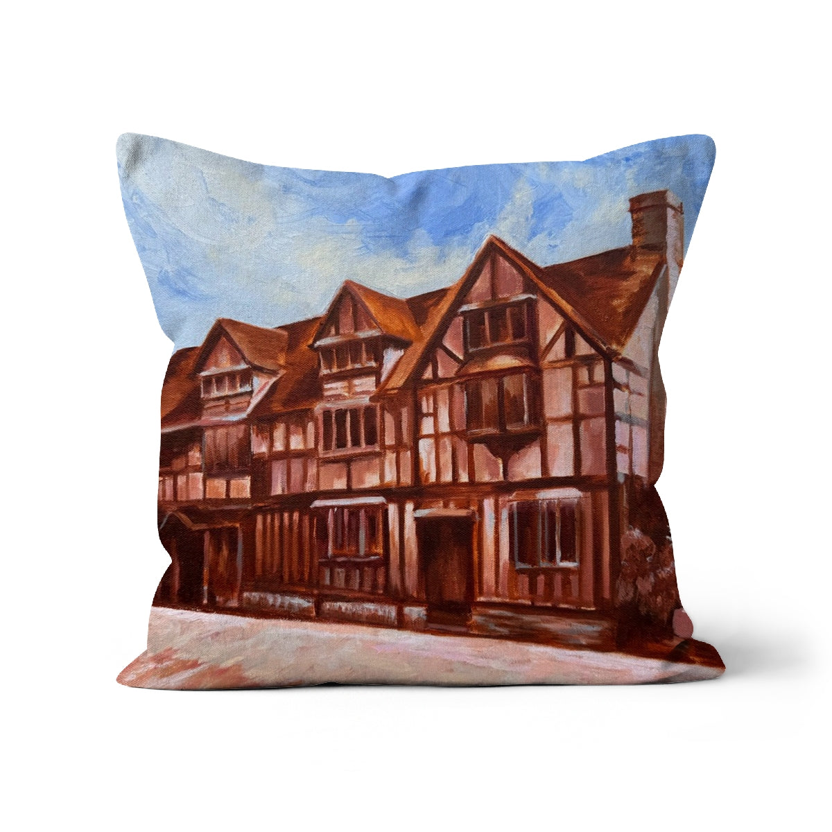 Cushion with a artwork of a Shakespeare's Birthplace half-timbered house 