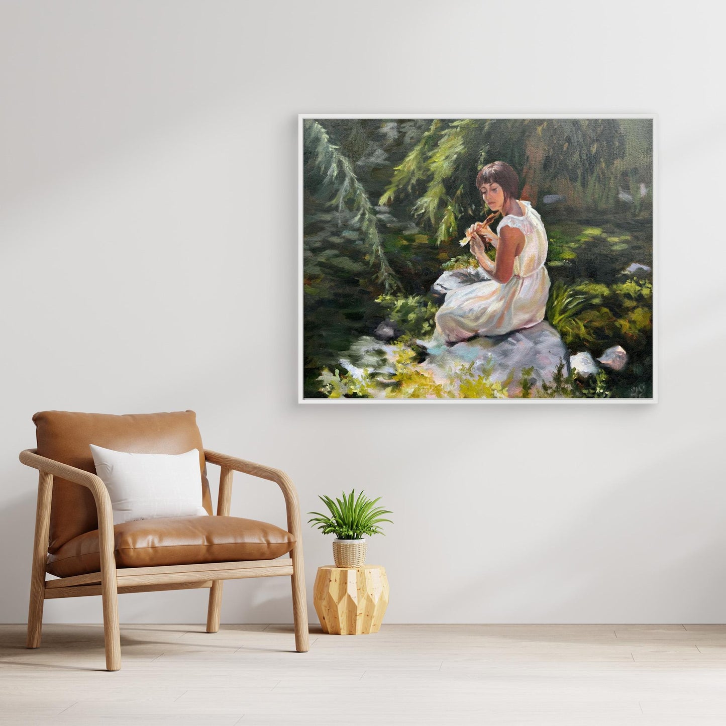 Stillness among the leaves lady sitting by pond with lily pads Canvas art print in white wooden frame room mockup
