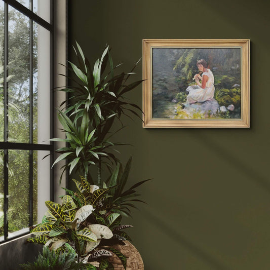 Stillness Among the Leaves original oil painting of a woman in a white dress seated beside a woodland pond with lily pads.