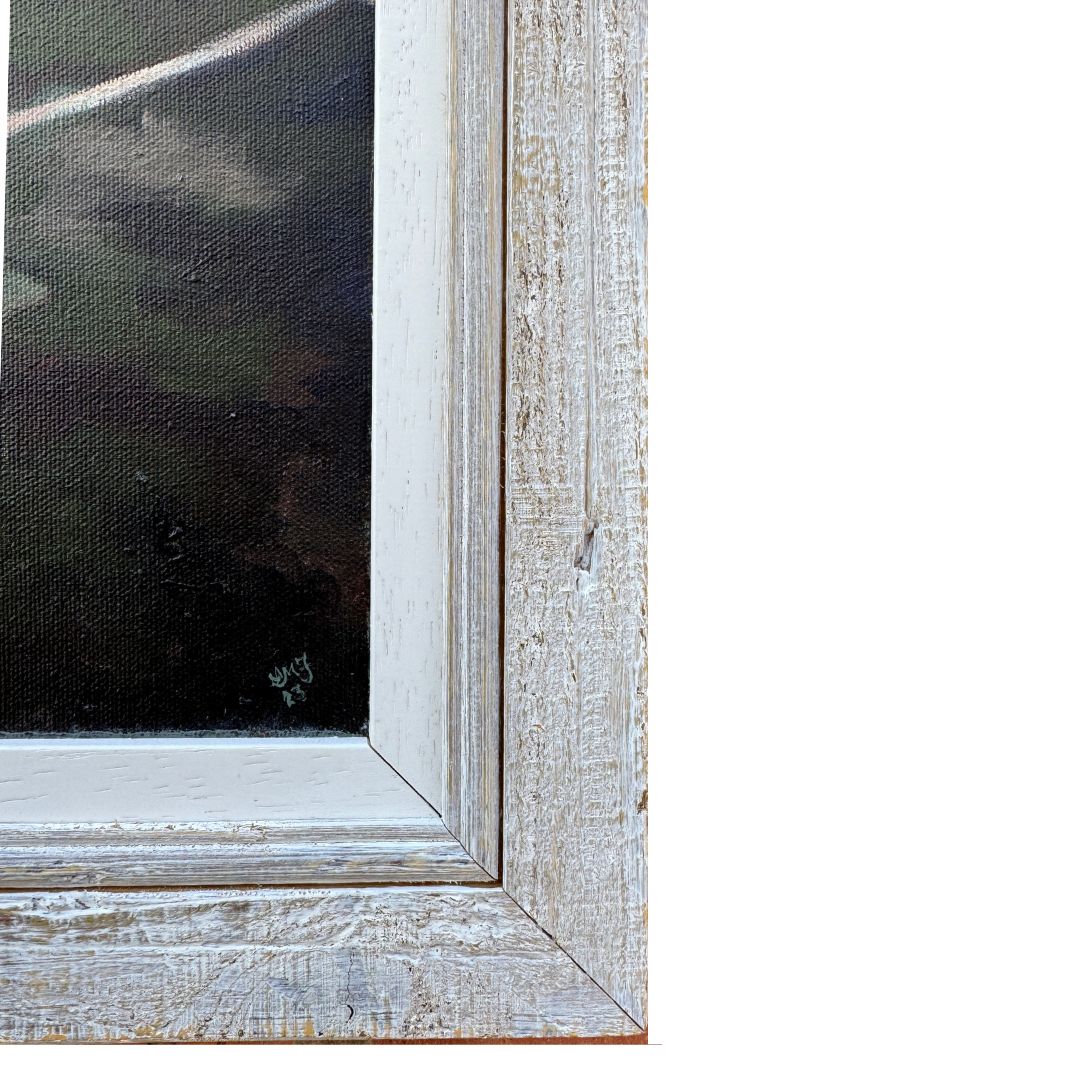 Wooden picture frame with a textured finish on a white background