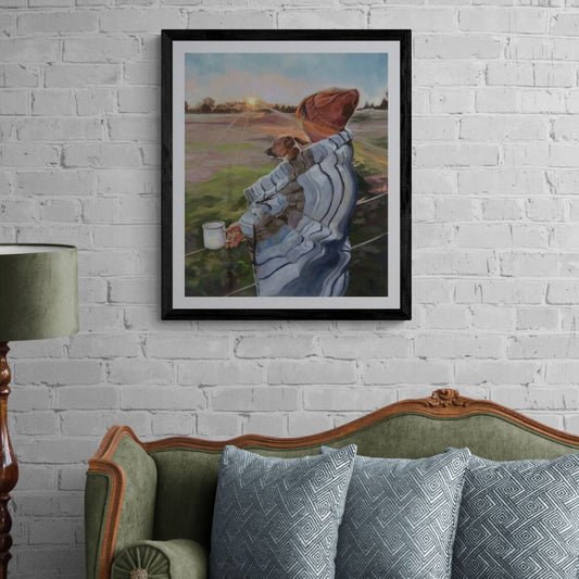 Sunrise with the Pup Jack Russel art print in black frame option above green sofa on white brick wall