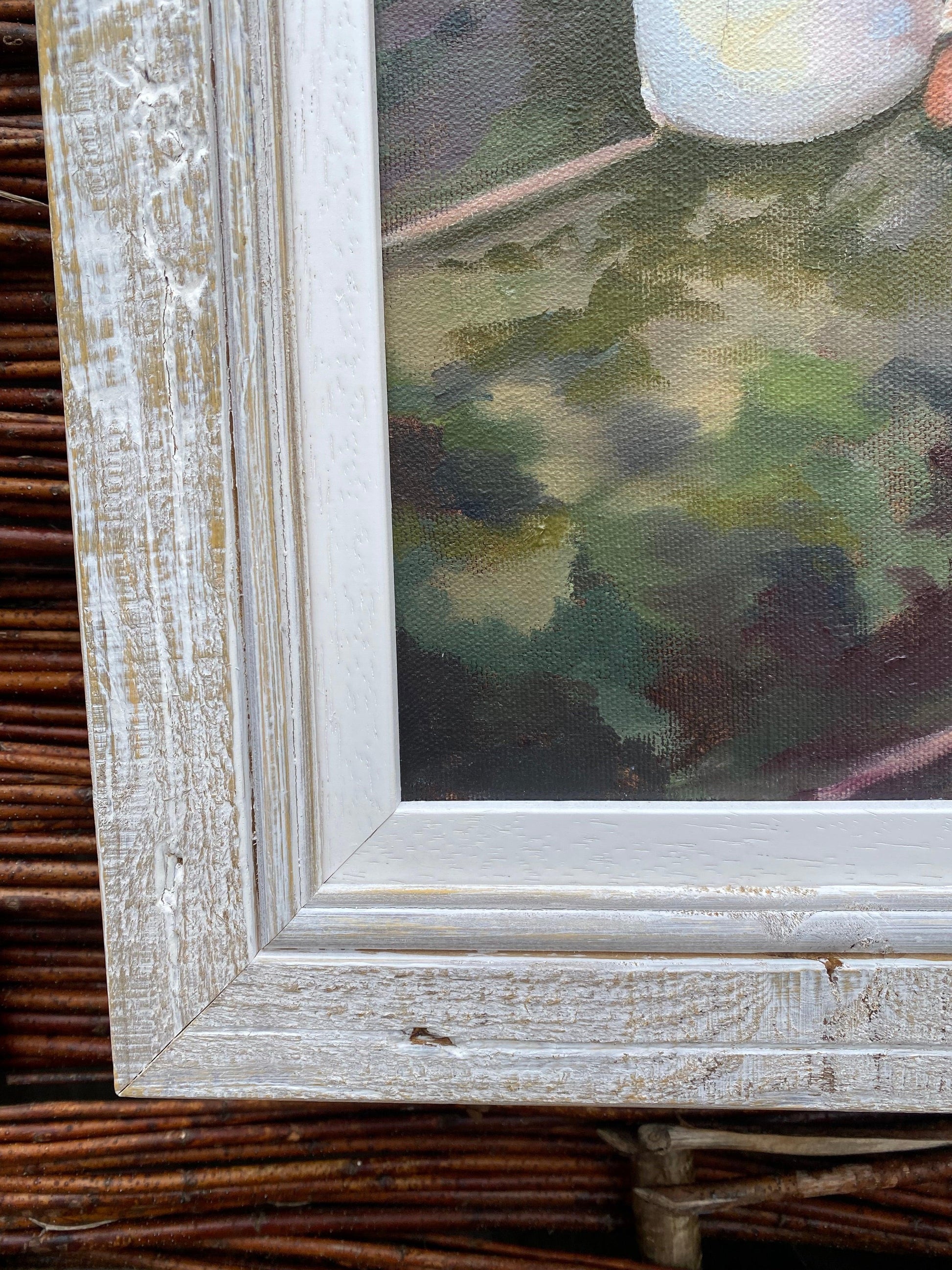 Detail of whitewashed wooden picture frame