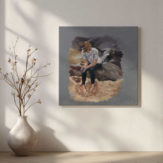 Unframed oil painting of a young lady sitting on a rock with a vase of dried branches on a wooden floor.