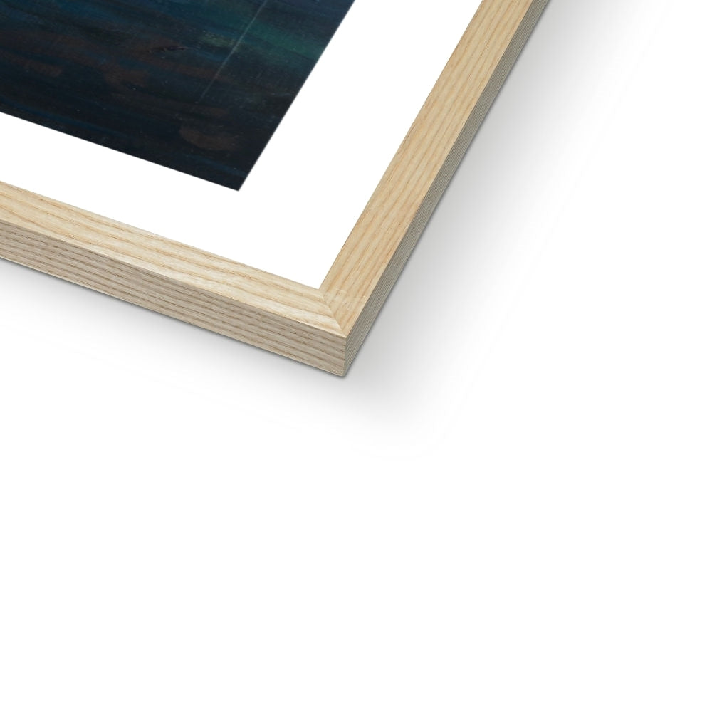 Close-up of a natural wooden picture frame corner on a white background