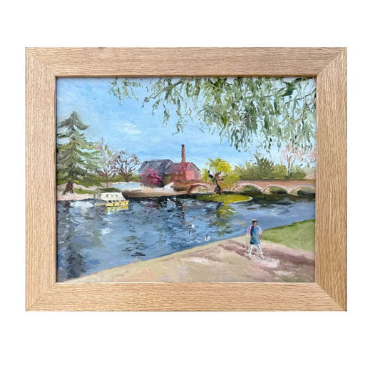 Original oil painting of a young girl beside the River Avon at Bridge Foot in Stratford-upon-Avon during a family day out, by Lorraine Field Art.