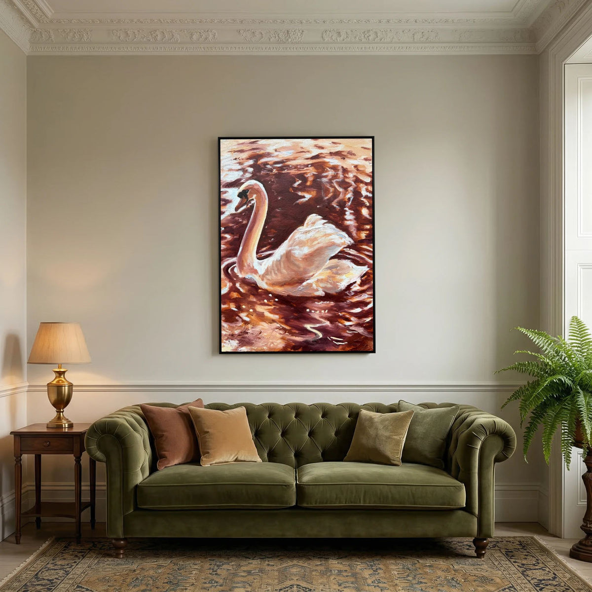 Becoming Grace swan canvas print displayed above a green velvet sofa
