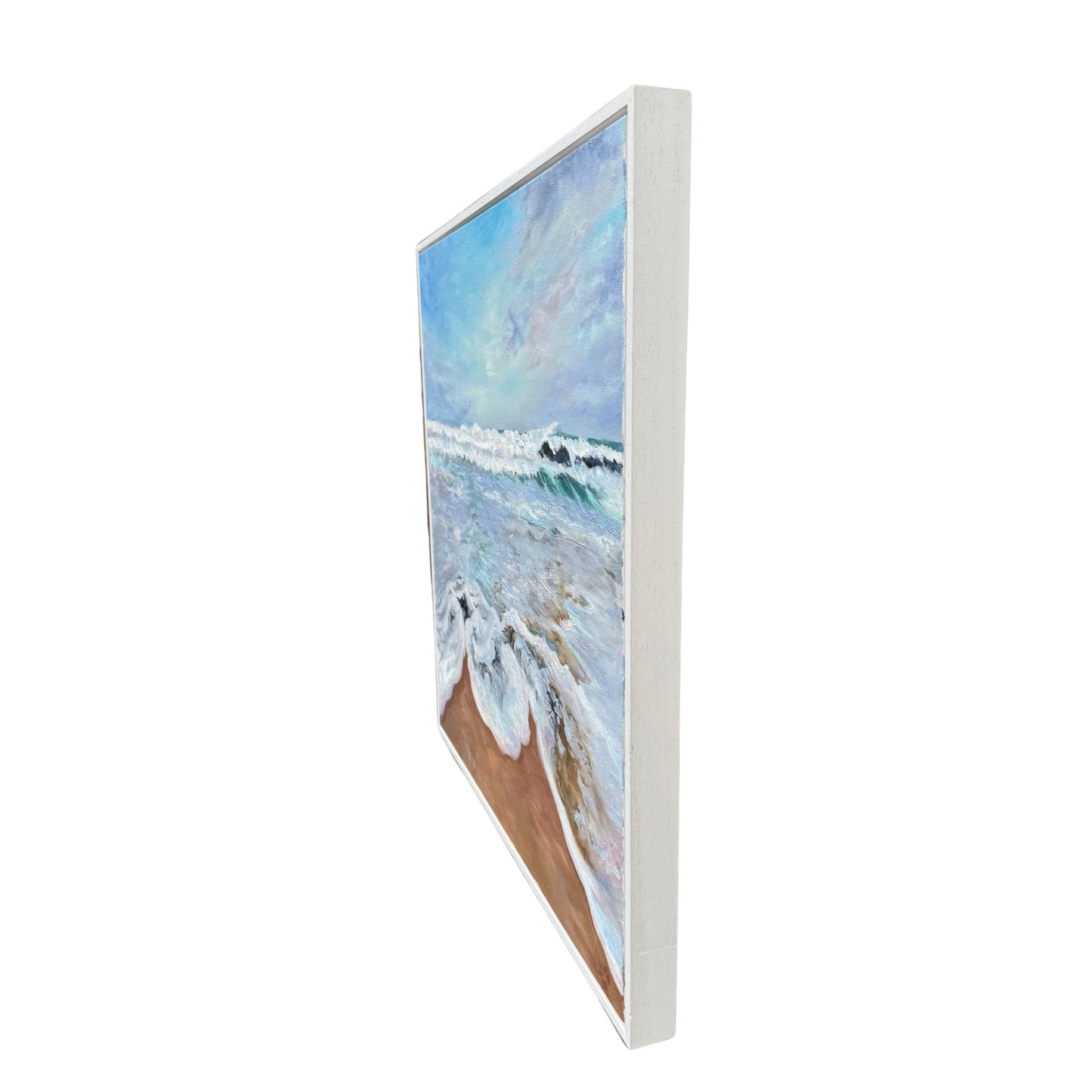 Side profile view of white framed Cornwall seascape oil painting.