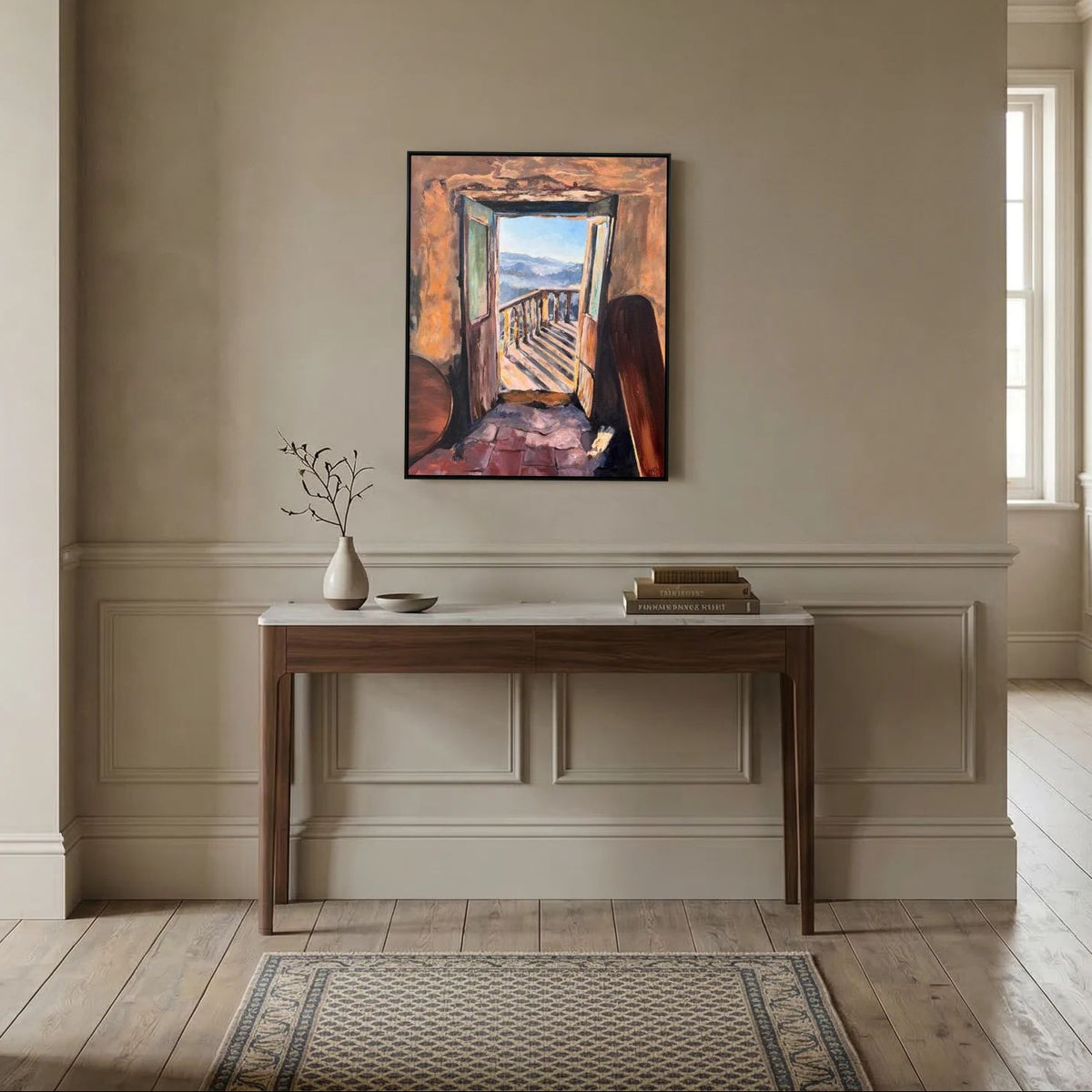 Doorway to Freedom framed canvas print displayed above a wooden console table in a neutral hallway