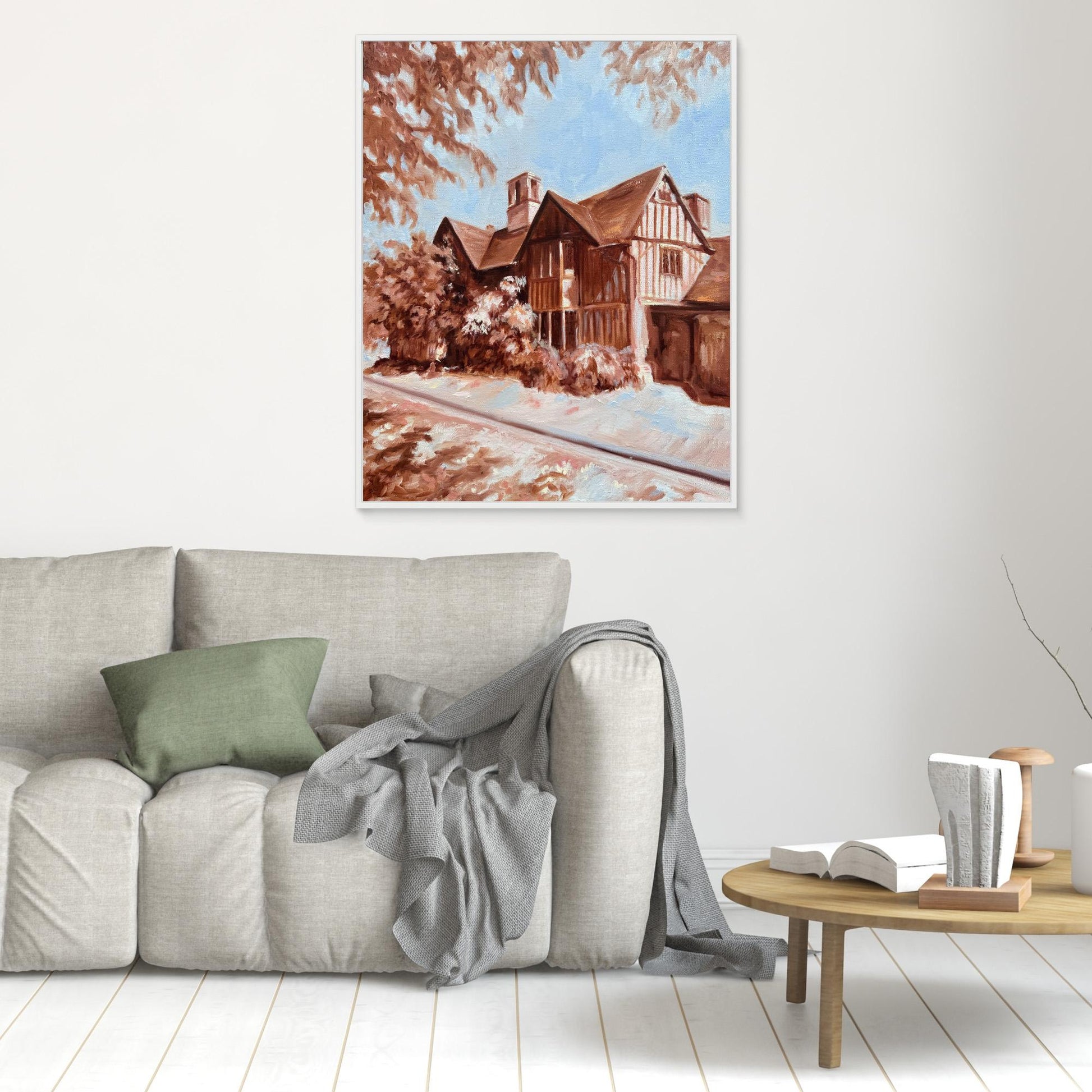 Hall’s Croft canvas print in white frame displayed above a sofa in a light, classic interior setting.
