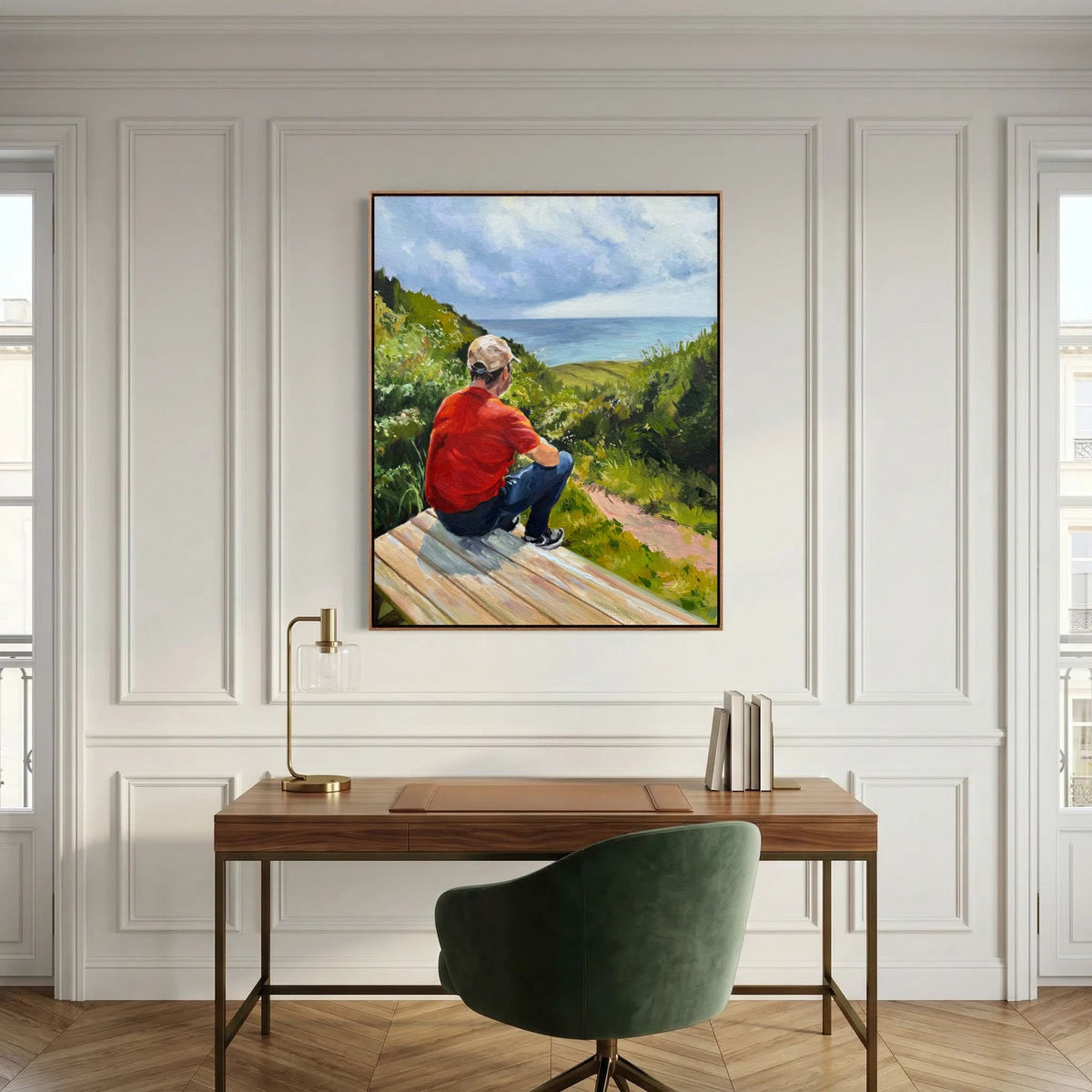 Just taking it in framed canvas print displayed above a desk in a white panelled room with a green chair.