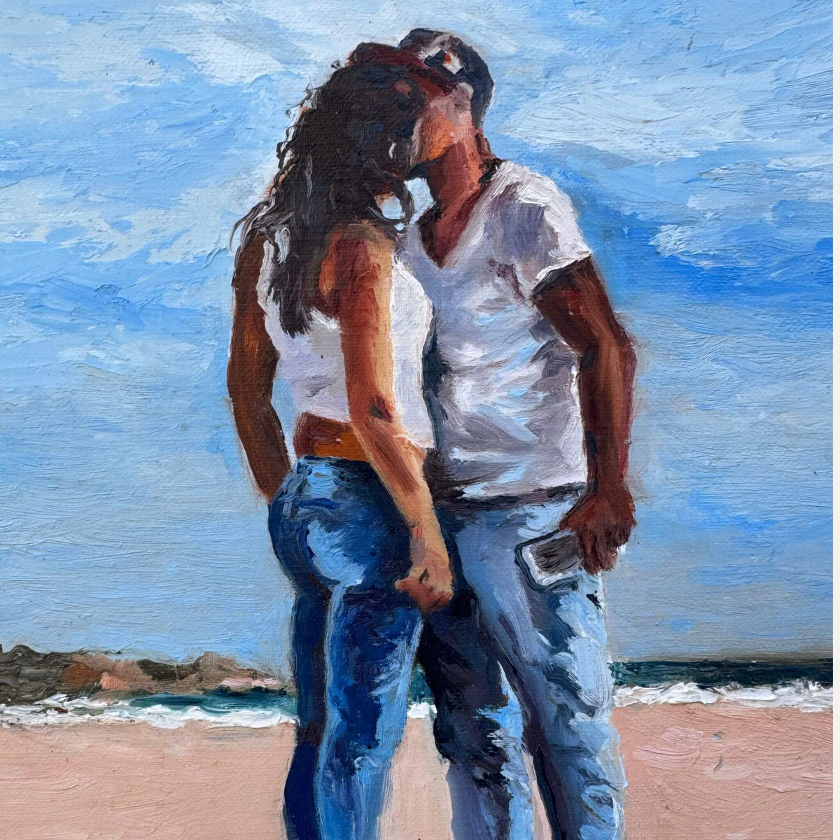 Close-up of the embracing couple in Mama, showing the textured oil brushwork, blue jeans and sunlit beach setting.