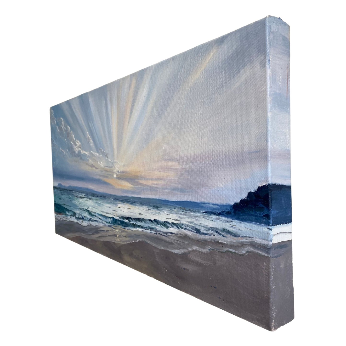Close-up of textured sunrise seascape painting with golden morning light over gentle waves.