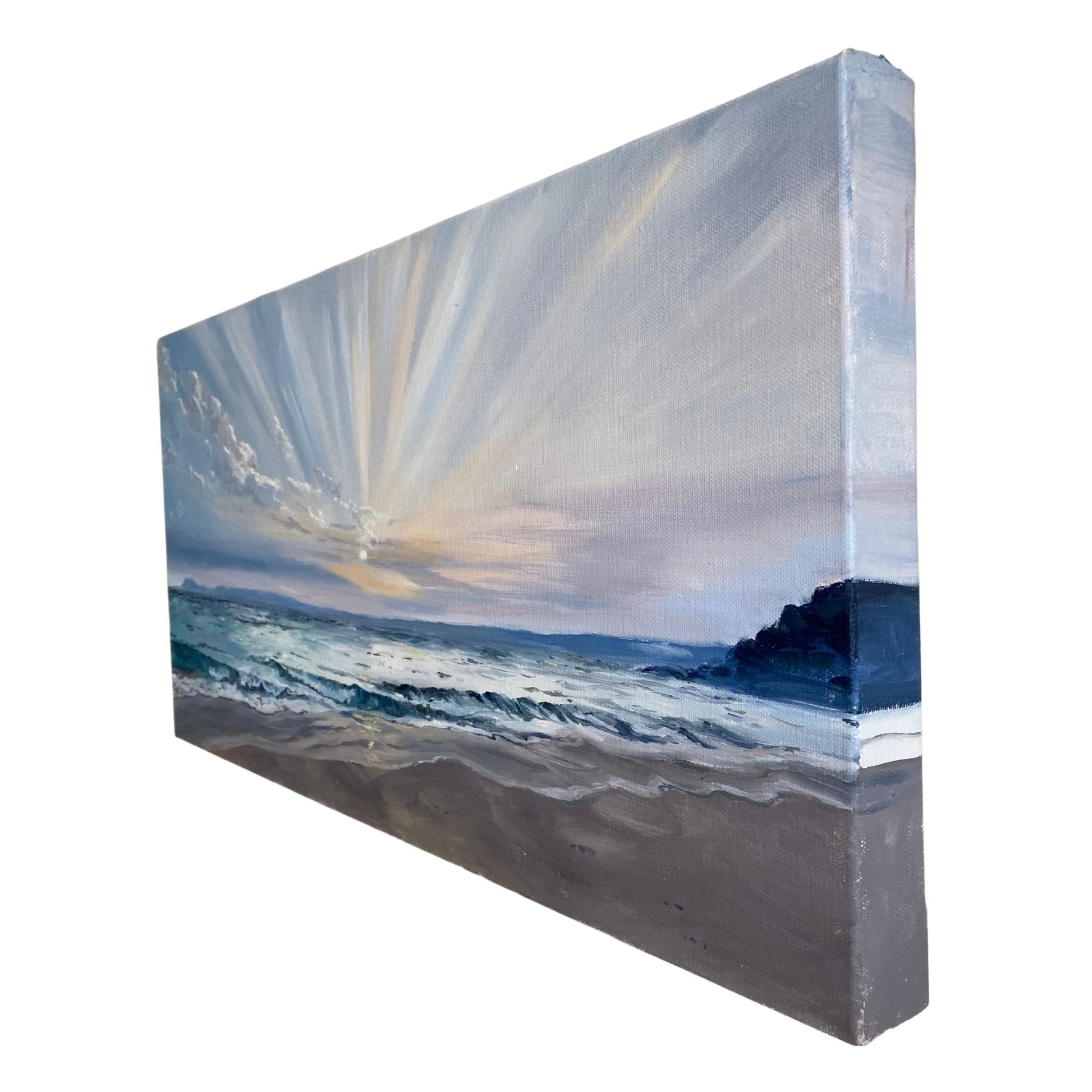 Close-up of textured sunrise seascape painting with golden morning light over gentle waves.