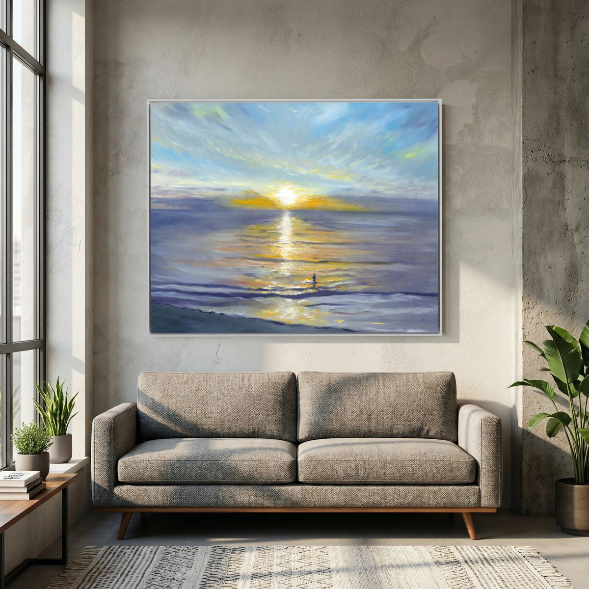Blue and gold sunrise canvas print Salute to the Sun displayed above a grey sofa.