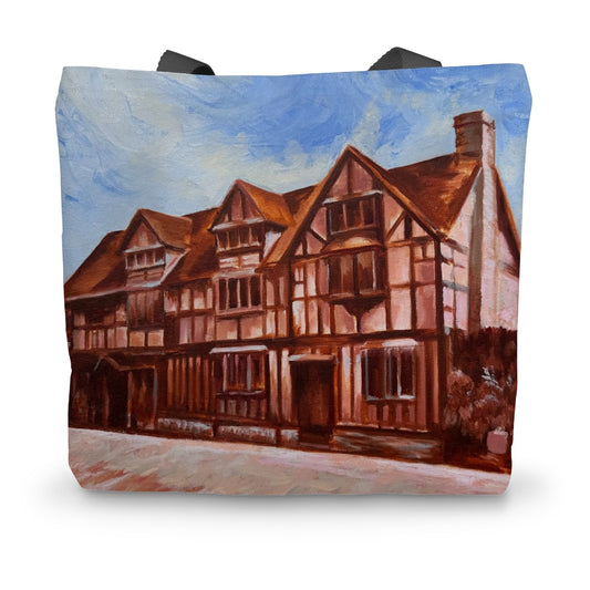 Front view of the Shakespeare’s Birthplace tote bag featuring Lorraine Field’s original Stratford-upon-Avon artwork printed on durable cream canvas with black handles