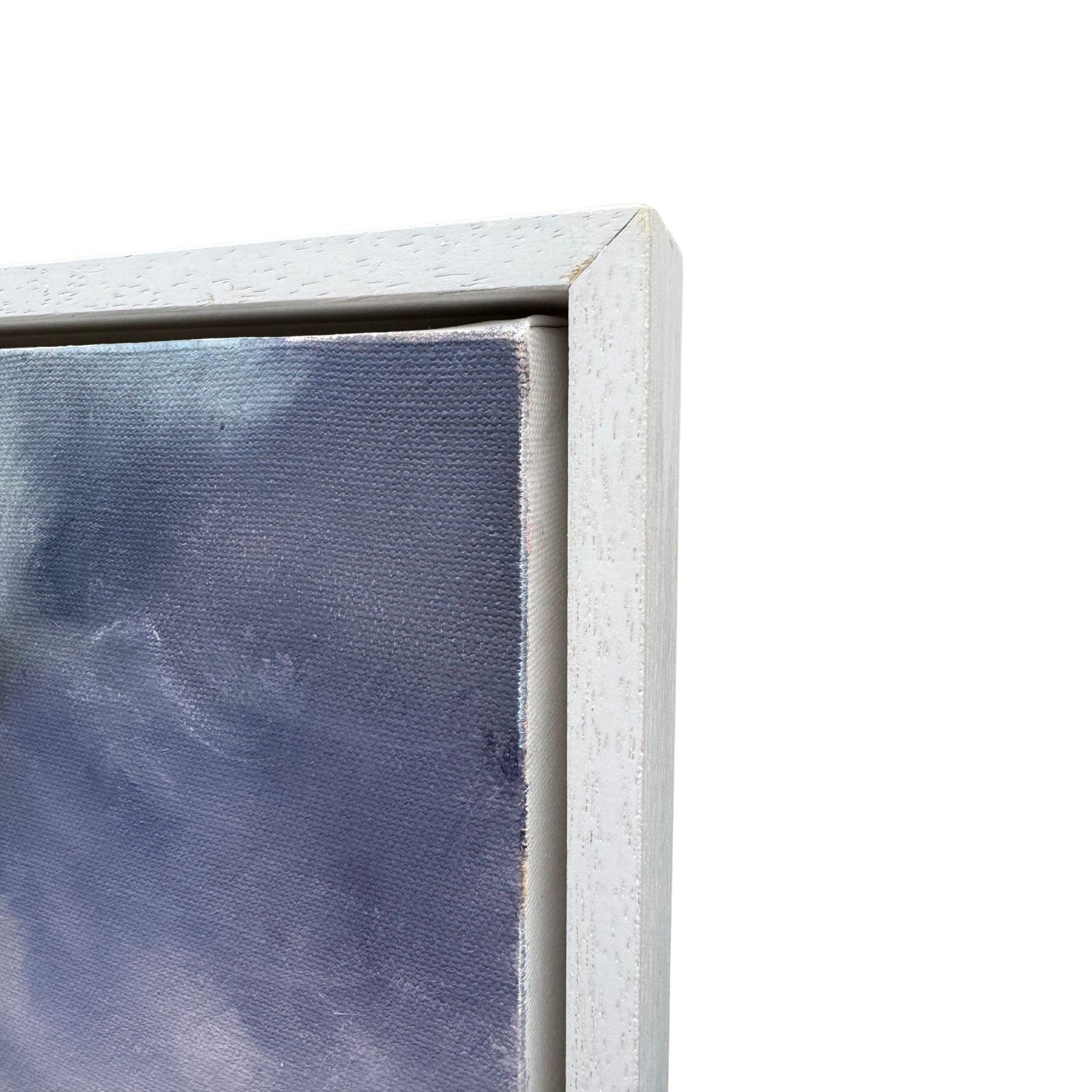 Close-up corner detail of framed Cornwall sunrise seascape painting by Lorraine Field.